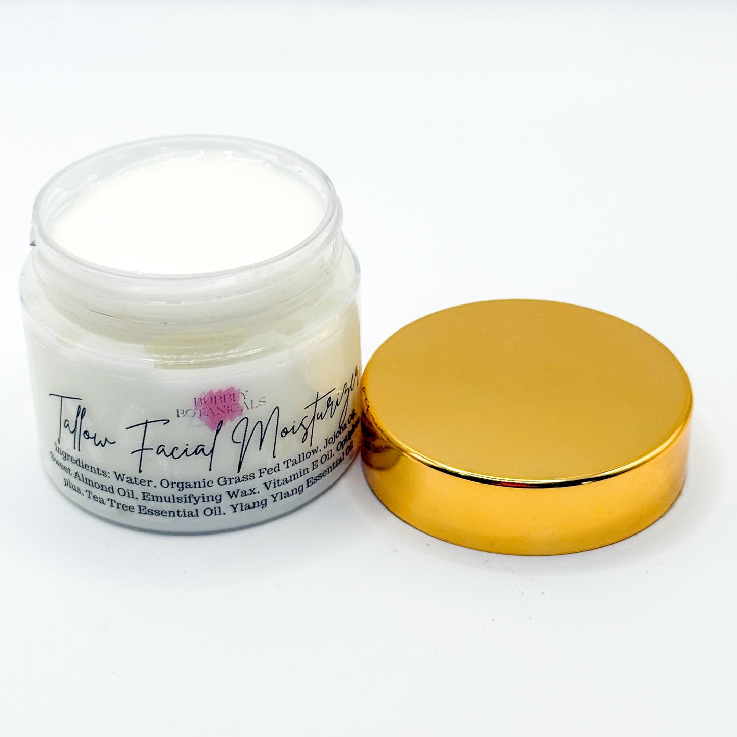 Skincare jar with gold lid on a white background