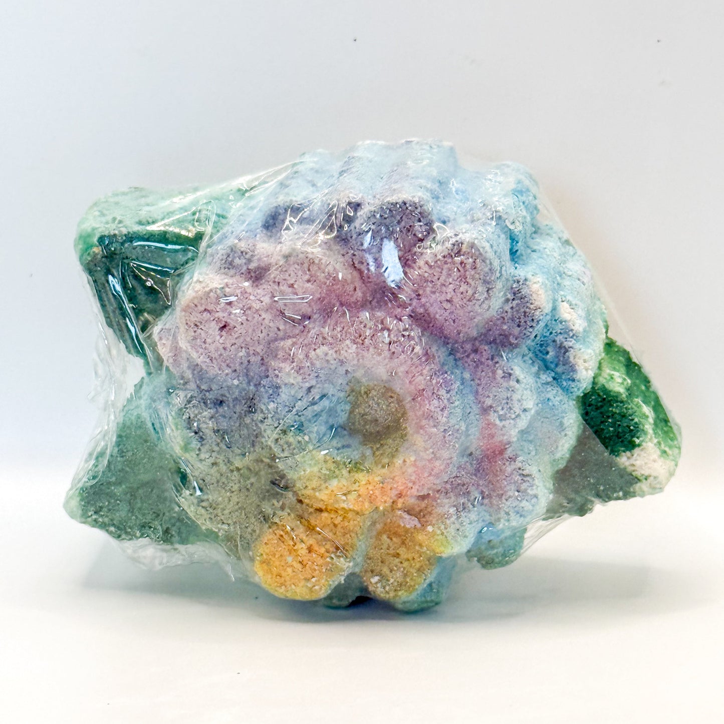 Colorful crystal rock on a white background