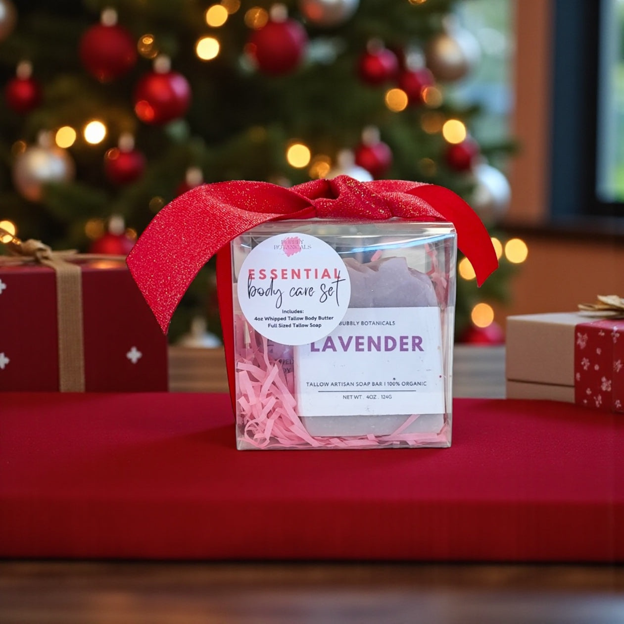 Lavender gift set with red ribbon in front of a Christmas tree