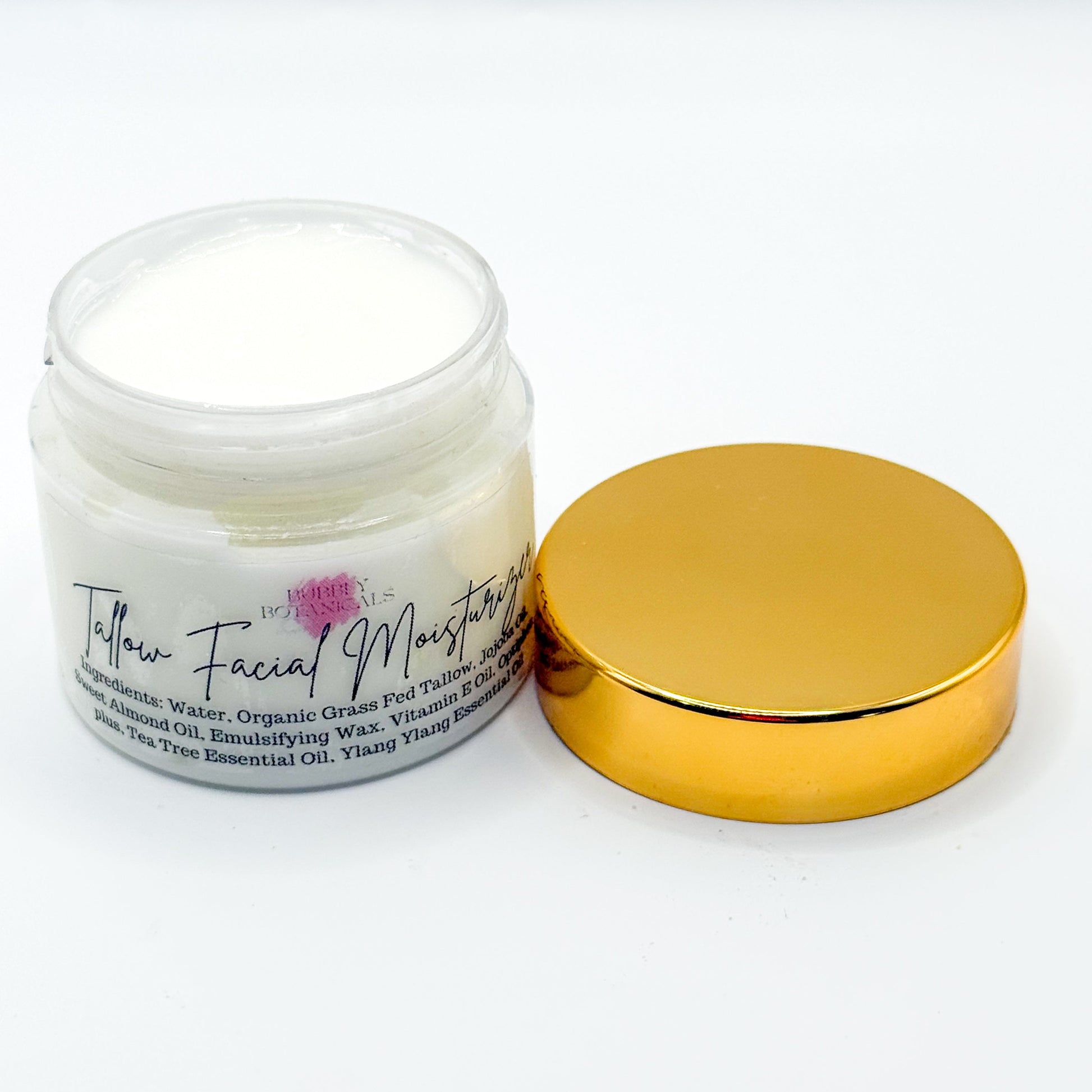 Skincare jar with gold lid on a white background