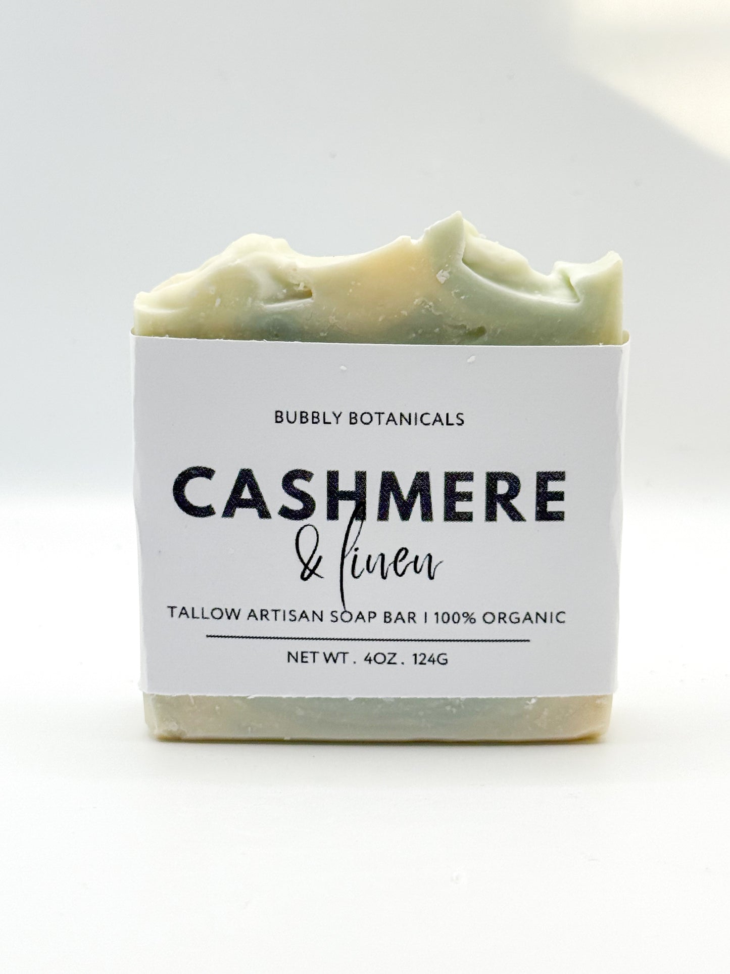 Cashmere & linen tallow soap with a white background 