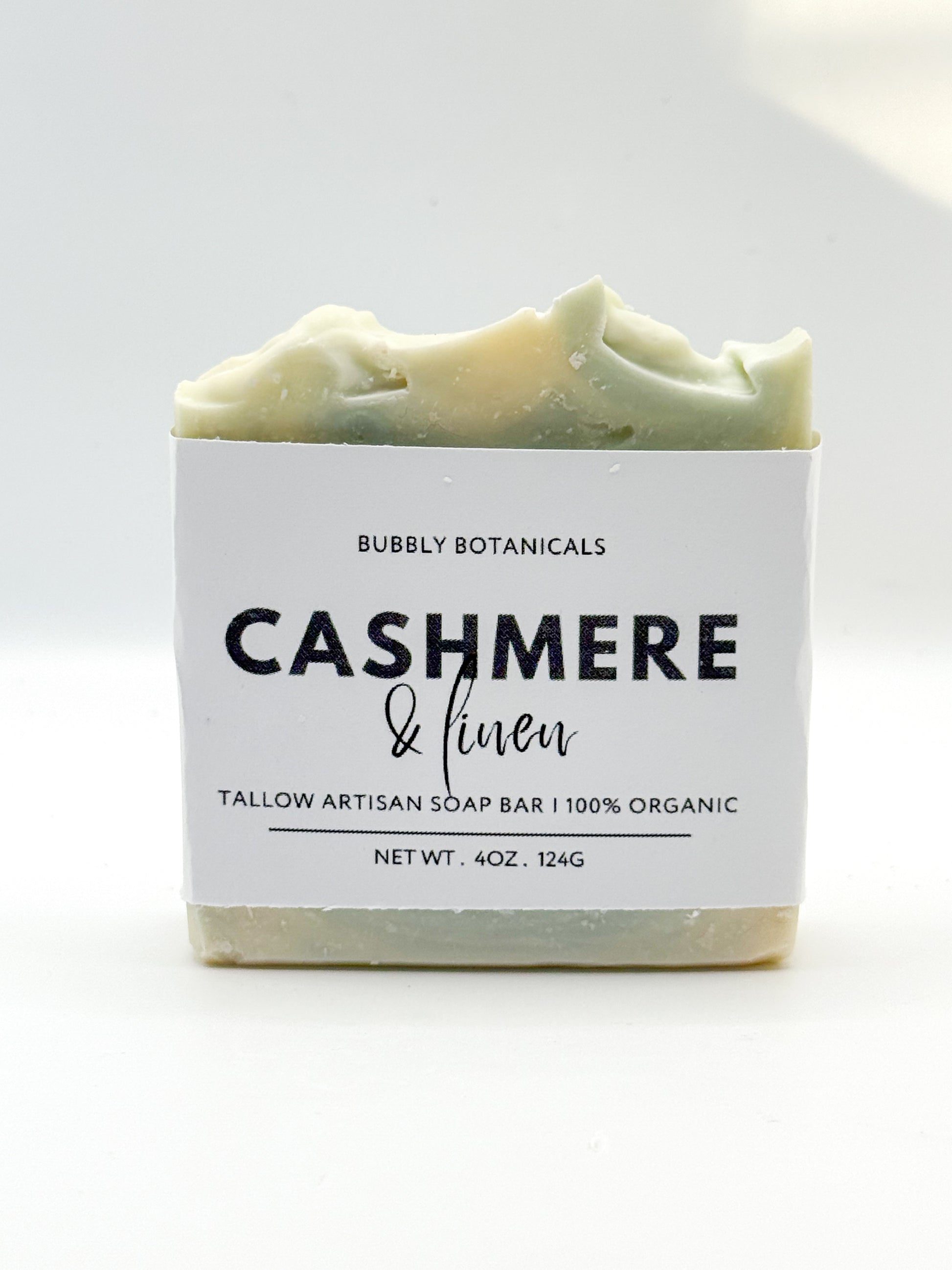 Cashmere & linen tallow soap with a white background 