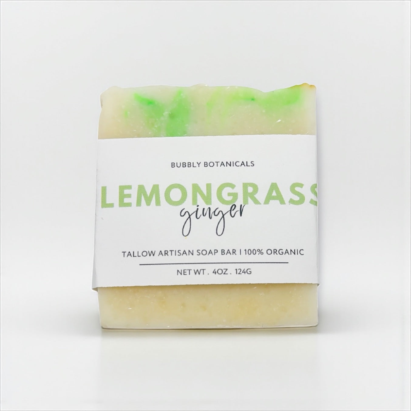 Bar of soap with a 'Lemongrass Ginger' label on a white background