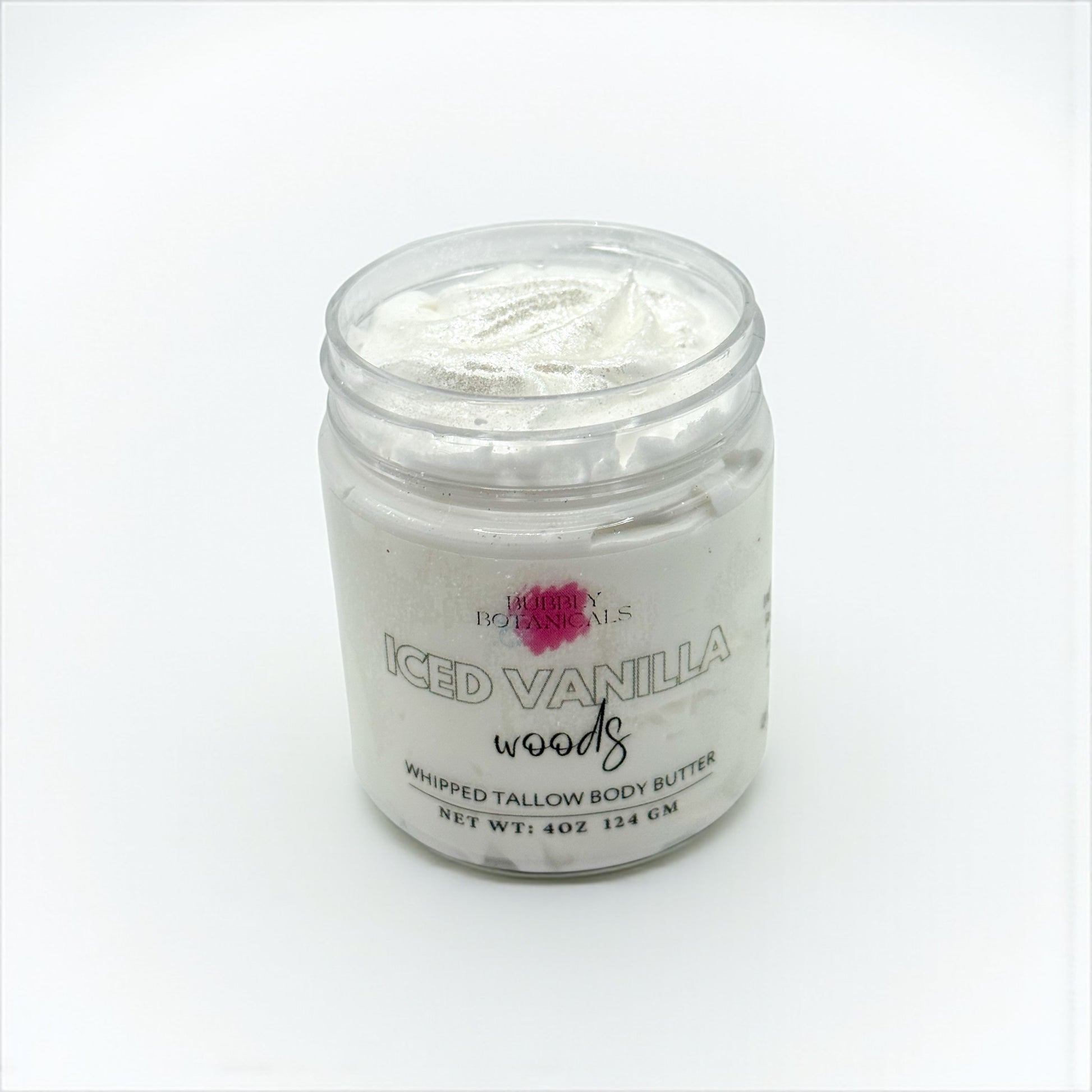 Jar of 'Iced Vanilla Woods' whipped tallow body butter on a white background