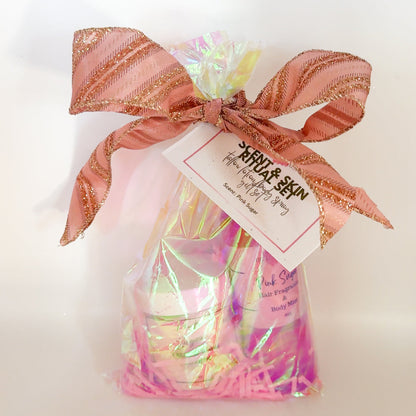 Gift bag with pink ribbon and a tag on a white background