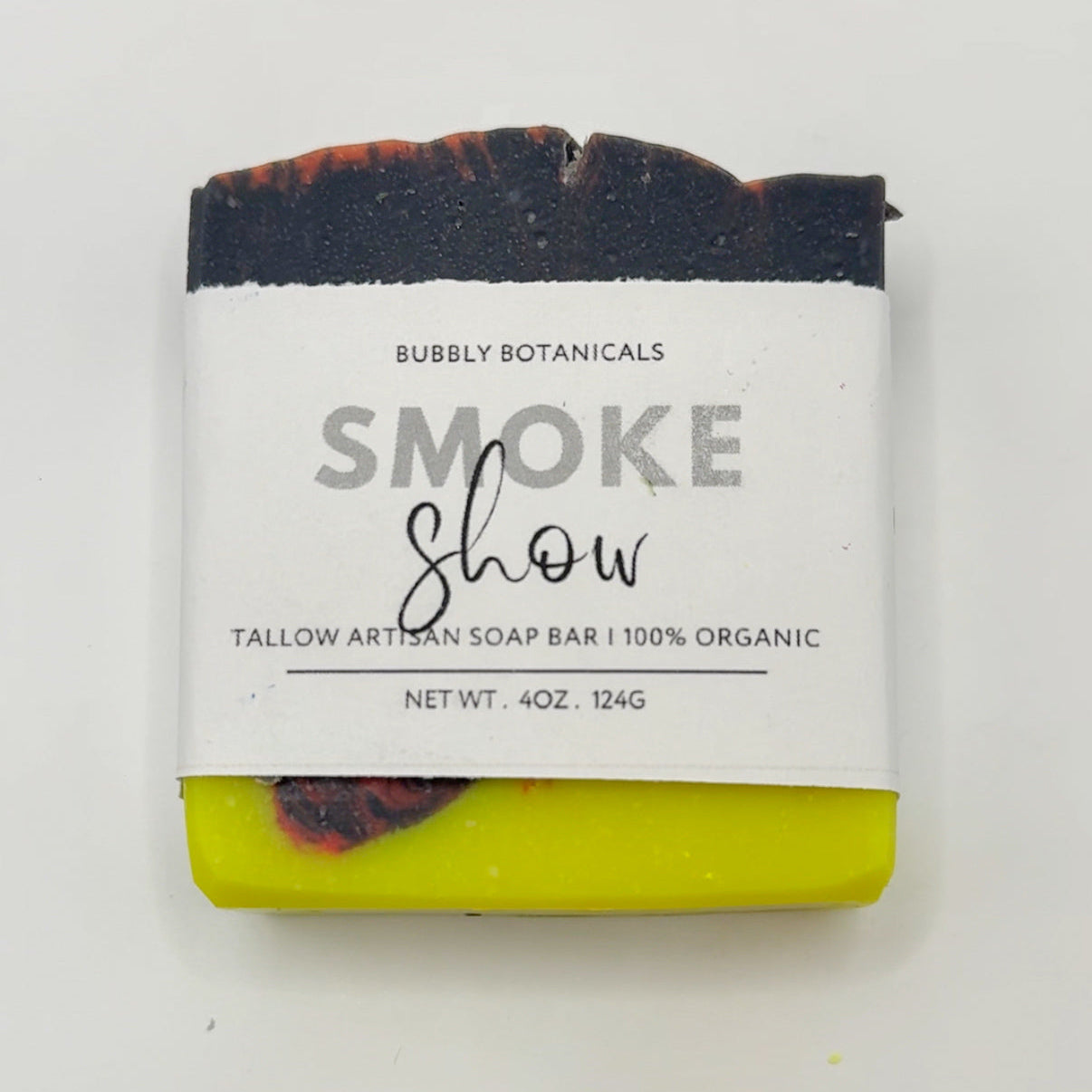 Bar of soap with a label on a white background