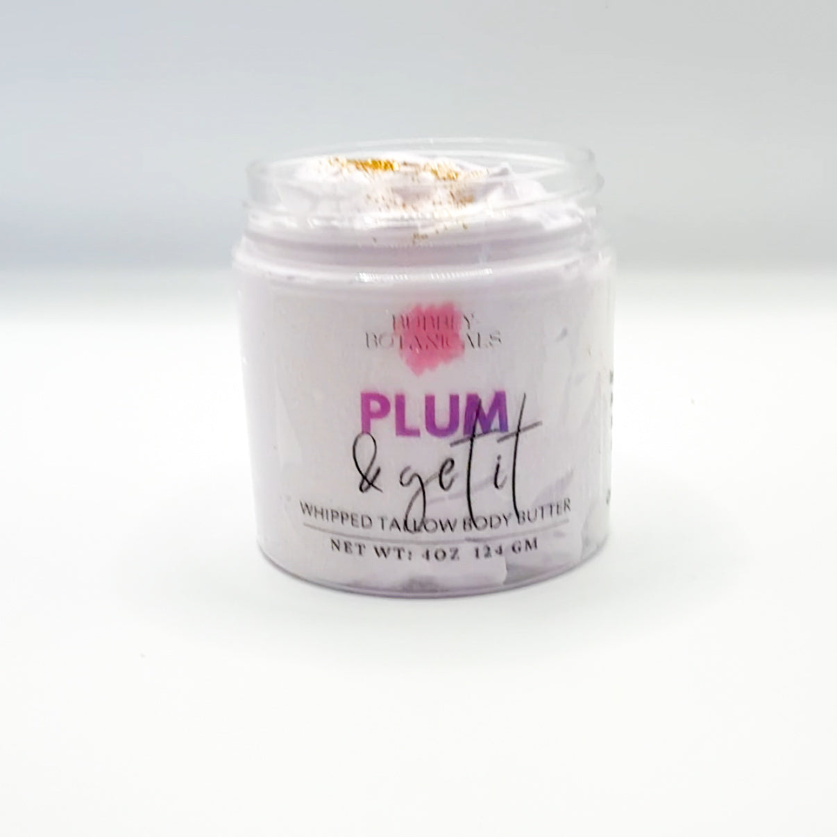 Jar of 'Plum & Get It' whipped tallow body butter with a white background