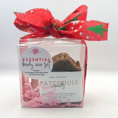 Essential body care set with a red bow on a white background