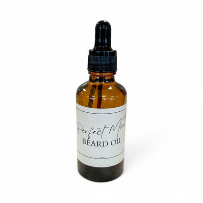 Brown glass bottle with black dropper labeled 'Perfect Man Beard Oil' on a white background