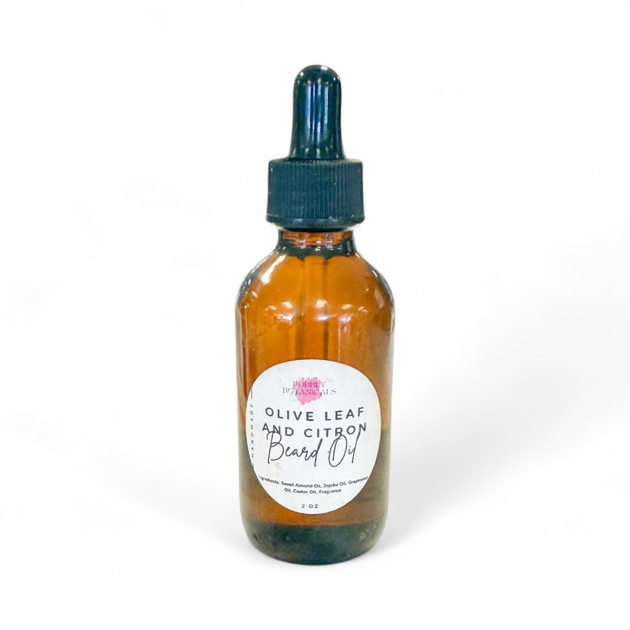 Bottle of olive leaf and citron beard oil with a dropper on a white background