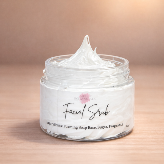 Jar of facial scrub with a pink flower logo on a beige background