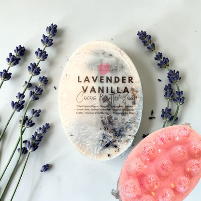 Lavender Vanilla soap bar with lavender flowers on a light background