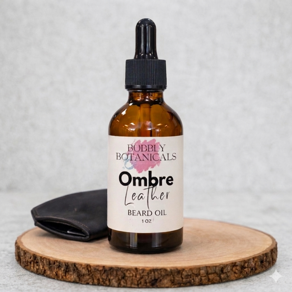 Bottle of Ombre Leather Beard Oil by Bubbly Botanicals on a wooden platform with a gray background