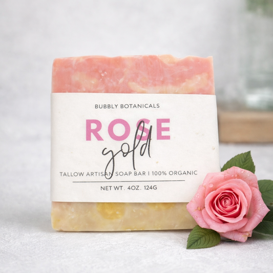 Bar of soap with 'Bubbly Botanicals' branding and a pink rose on a light background