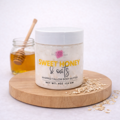 Jar of 'Sweet Honey & Oats'  tallow body butter on a wooden board with honey and oats.