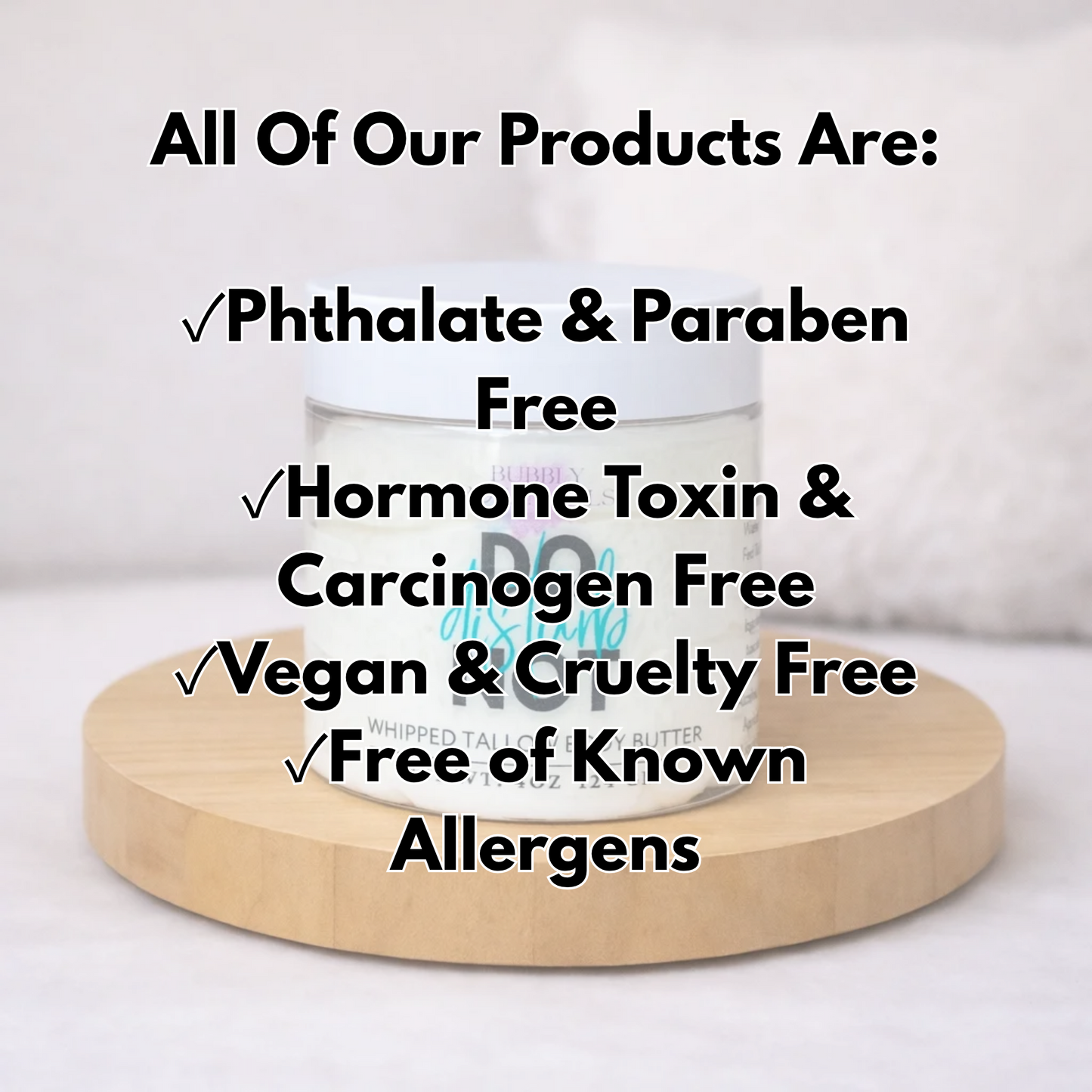 A jar of whipped tallow butter sits on a round wooden platform with large black text overlay listing product benefits such as phthalate and paraben free, hormone toxin and carcinogen free, vegan and cruelty free, and free of known allergens.