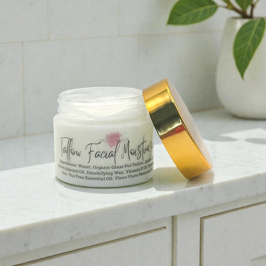 Facial moisturizer jar with gold lid on a marble surface