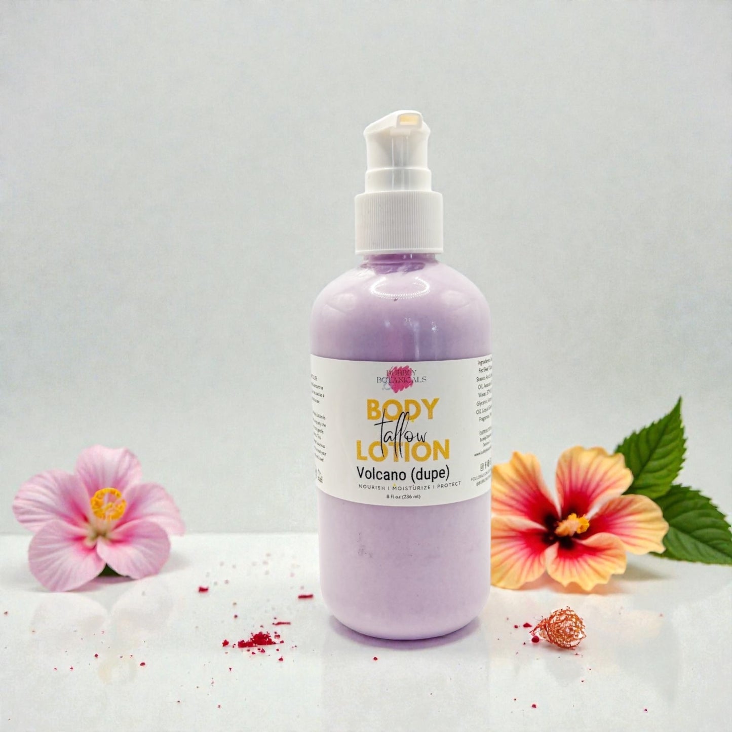 Body lotion bottle with flowers on a light gray background