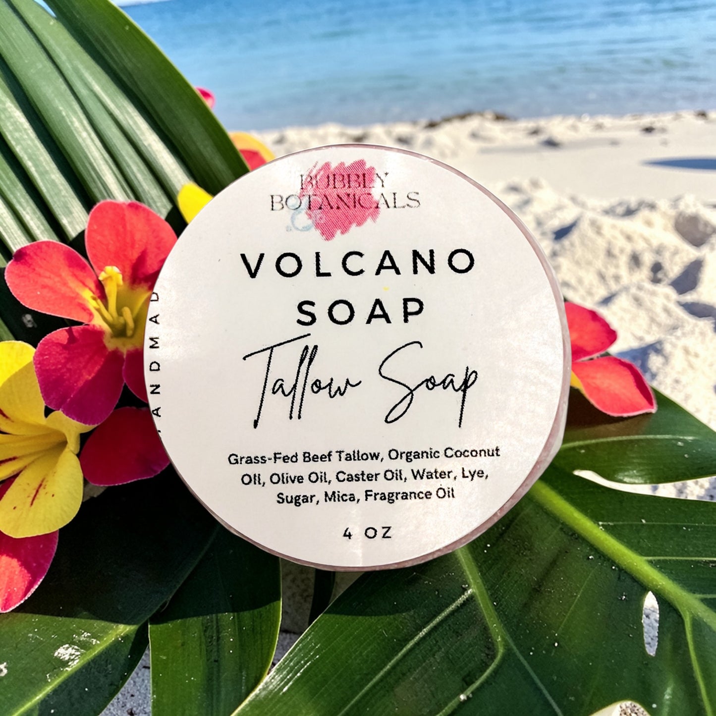 Volcano soap container with beach and flowers in the background