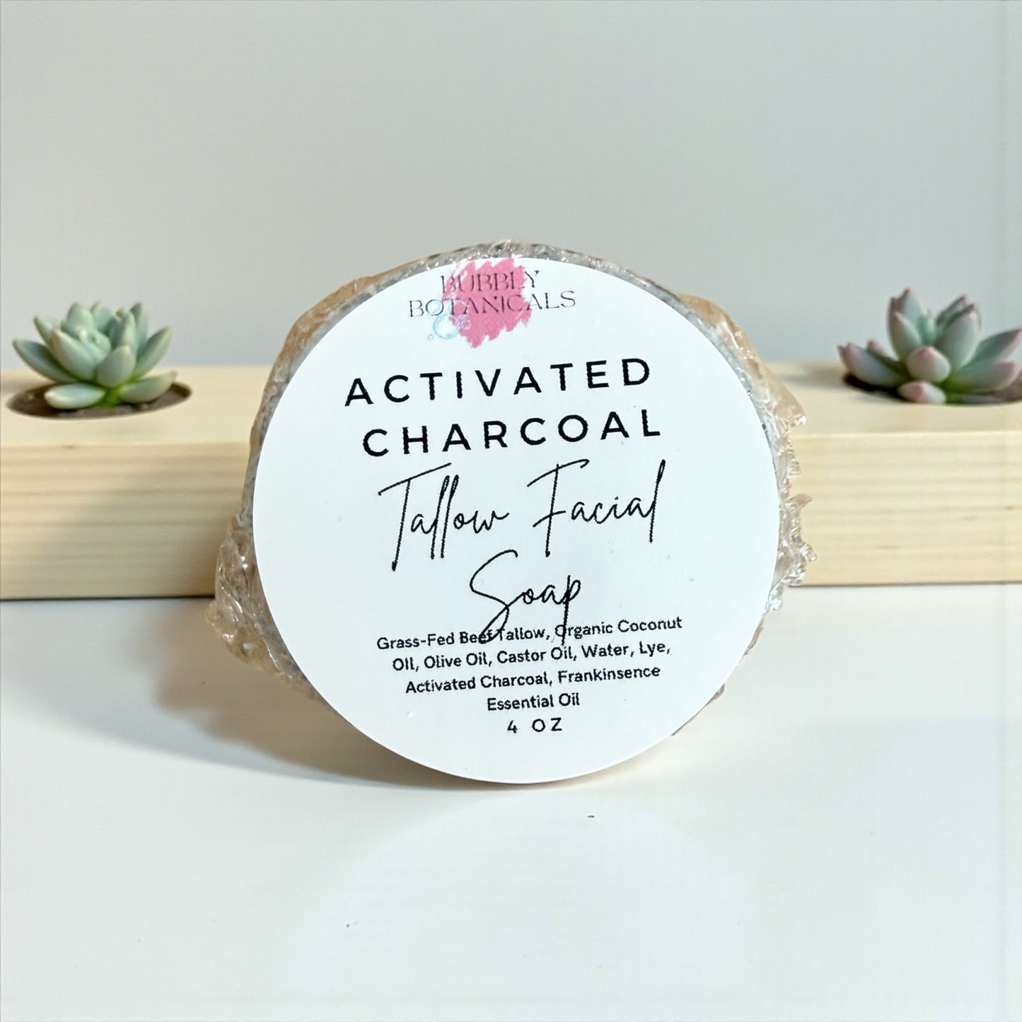 Activated Charcoal Tallow Facial Soap with label on a white background