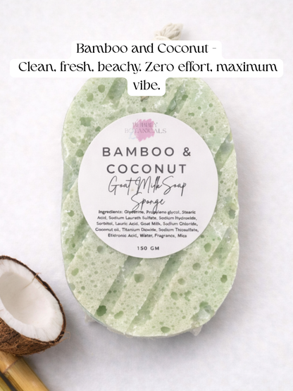 A light green and white speckled goat milk soap sponge bar labeled 'BAMBOO & COCONUT' on a white background, with a half coconut and bamboo stick as props, and text at the top reading 'Bamboo and Coconut - Clean, fresh, beachy. Zero effort, maximum vibe.