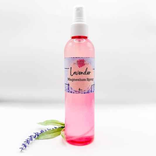 Pink spray bottle labeled 'Lavender Magnesium Spray' on a white background