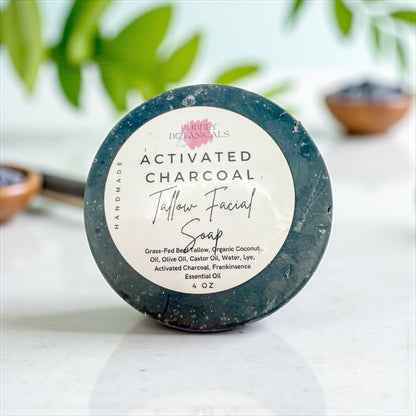Charcoal Detox tallow facial bar by Bubbly Botanicals with greenery