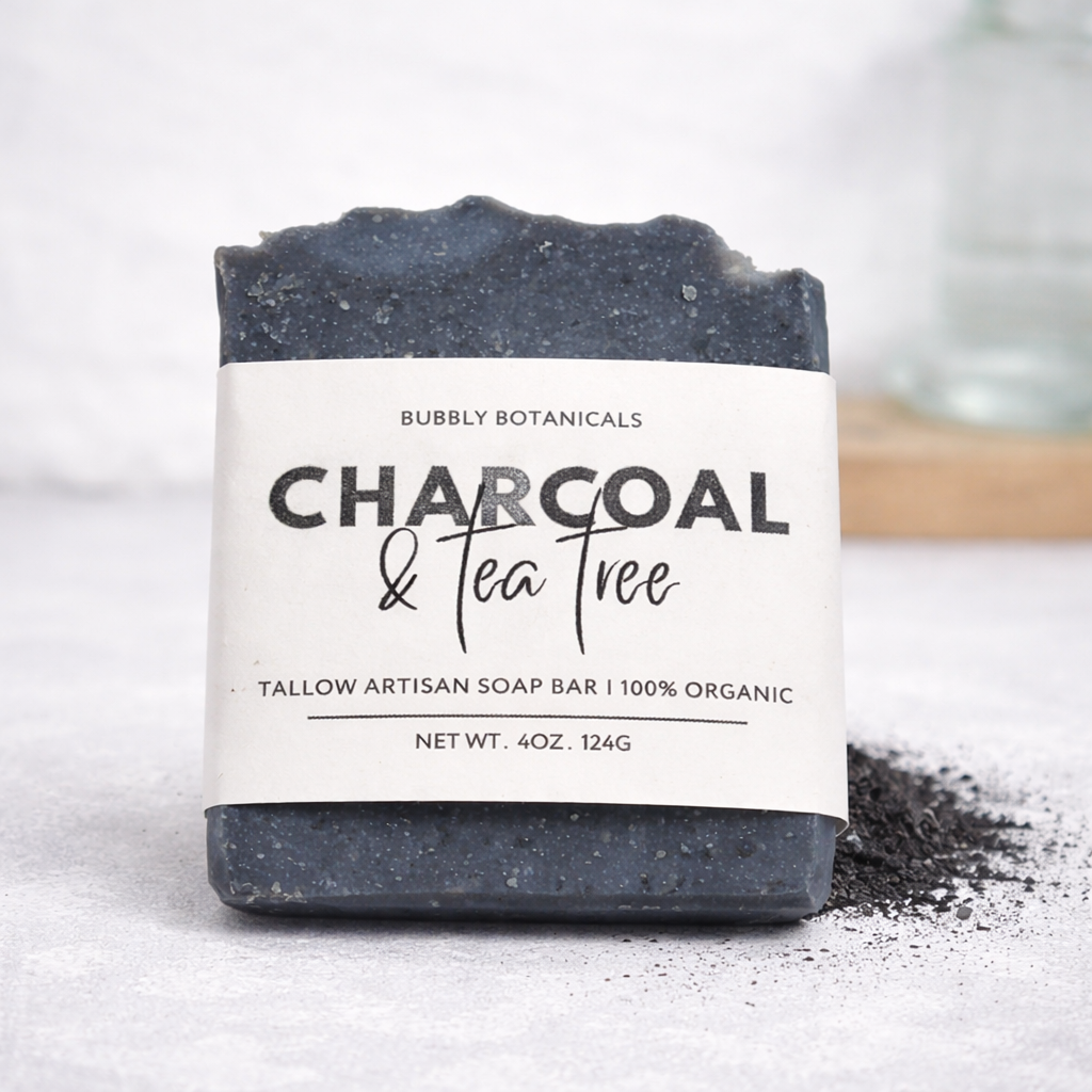 Bar of charcoal soap with a label on a light background