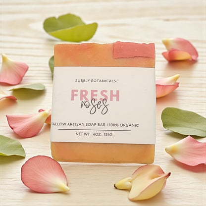 Fresh Roses tallow soap by Bubbly Botanicals on a wooden surface with rose petals