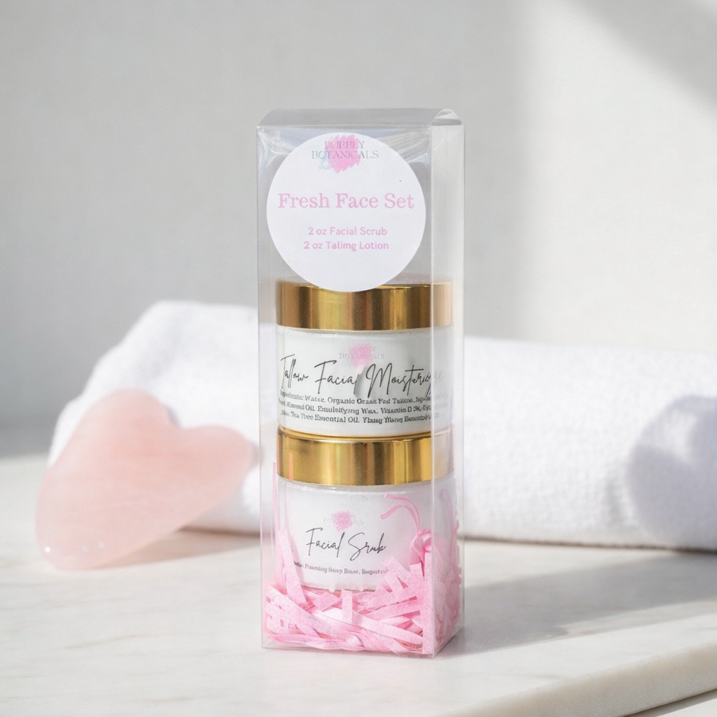 Packaged facial scrub with pink and gold design on a white surface