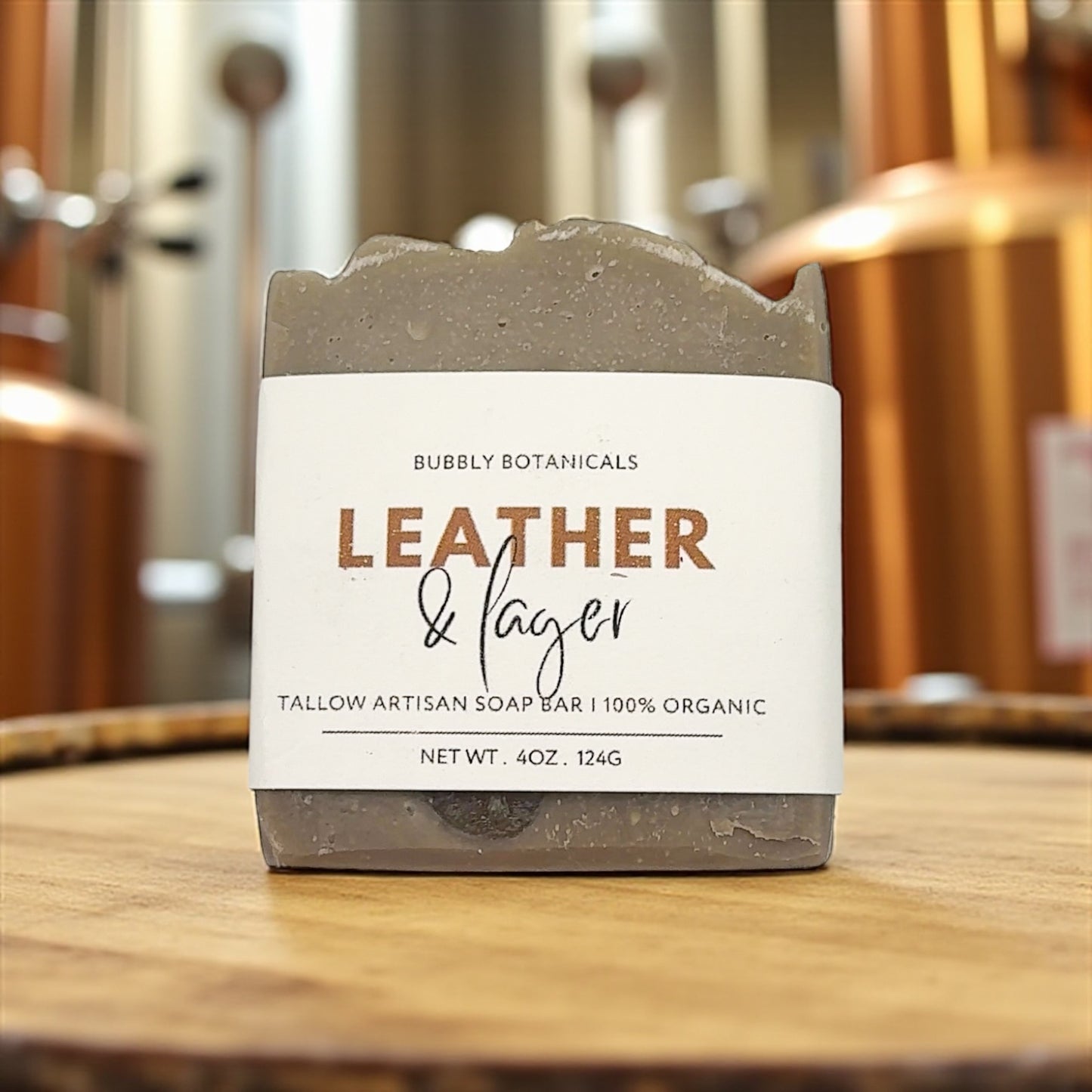 Soap bar with a label on a wooden surface