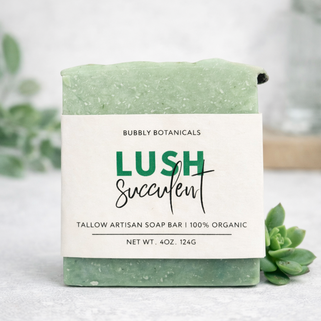 Green lush succulent grass-fed tallow soap bar with a white label on a light background