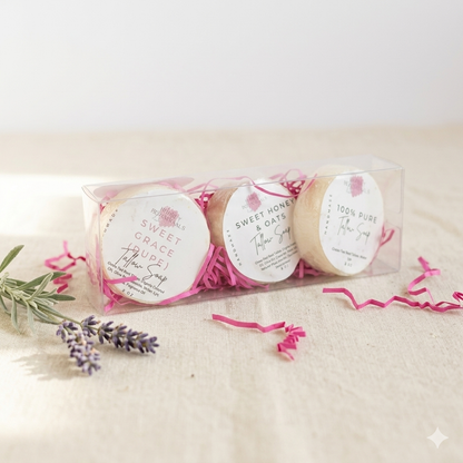 Set of three Mini Tallow Soaps in Mini Tallow Soap Gift Set with visible branding on a light background