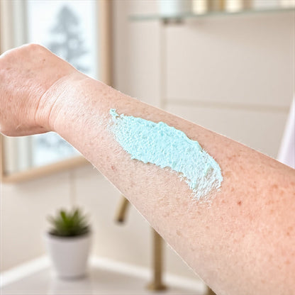 Person applying mint and menthol foot scrub by Bubbly Botanicals
