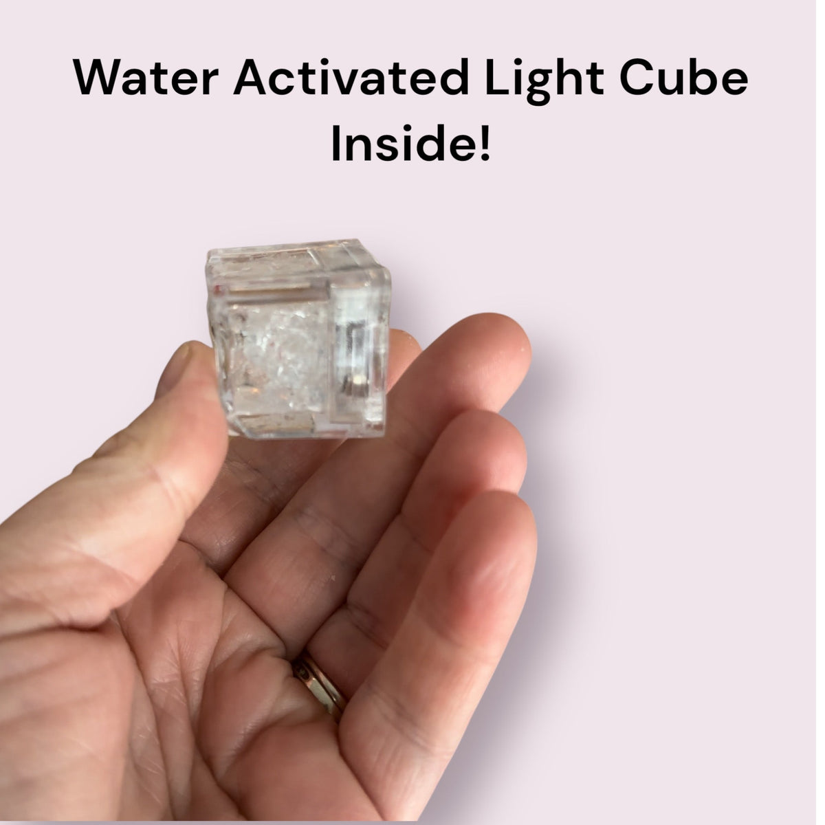 Party Bomb bath bomb by Bubbly Botanicals with a water activated light cube inside
