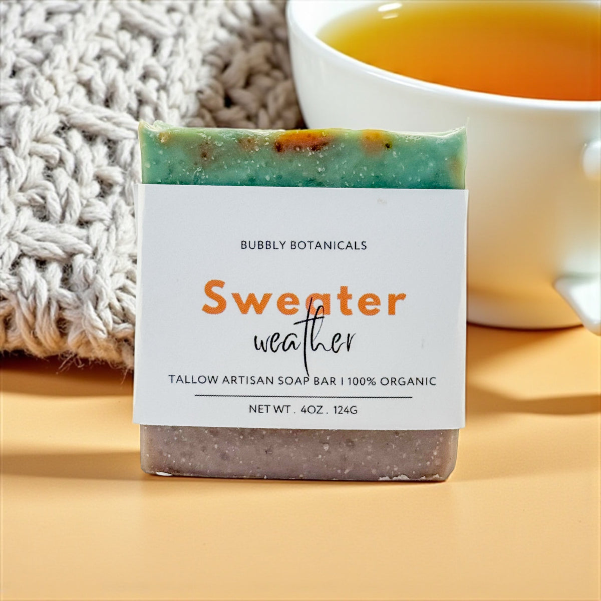 Sweater Weather tallow soap by Bubbly Botanicals on a wooden table