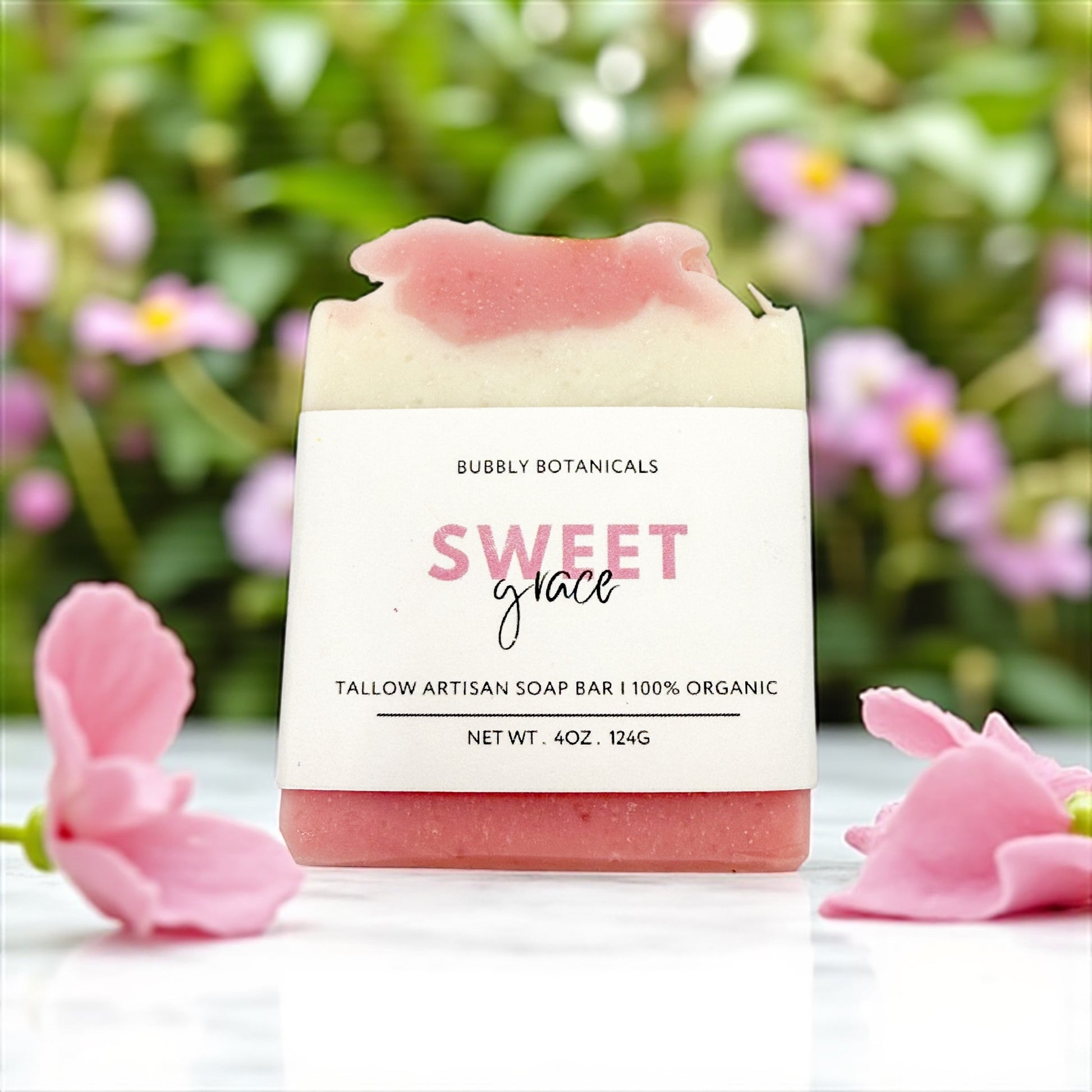 Sweet Grace grass-fed tallow soap with a floral background
