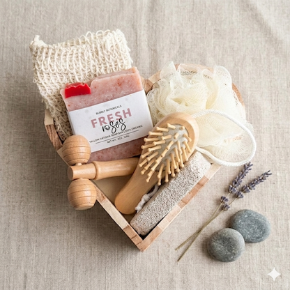 Set of natural skincare products including tallow soap in a fresh roses scent,body brush, pumice stone loofah, soap savere bag, and body massager on a neutral background